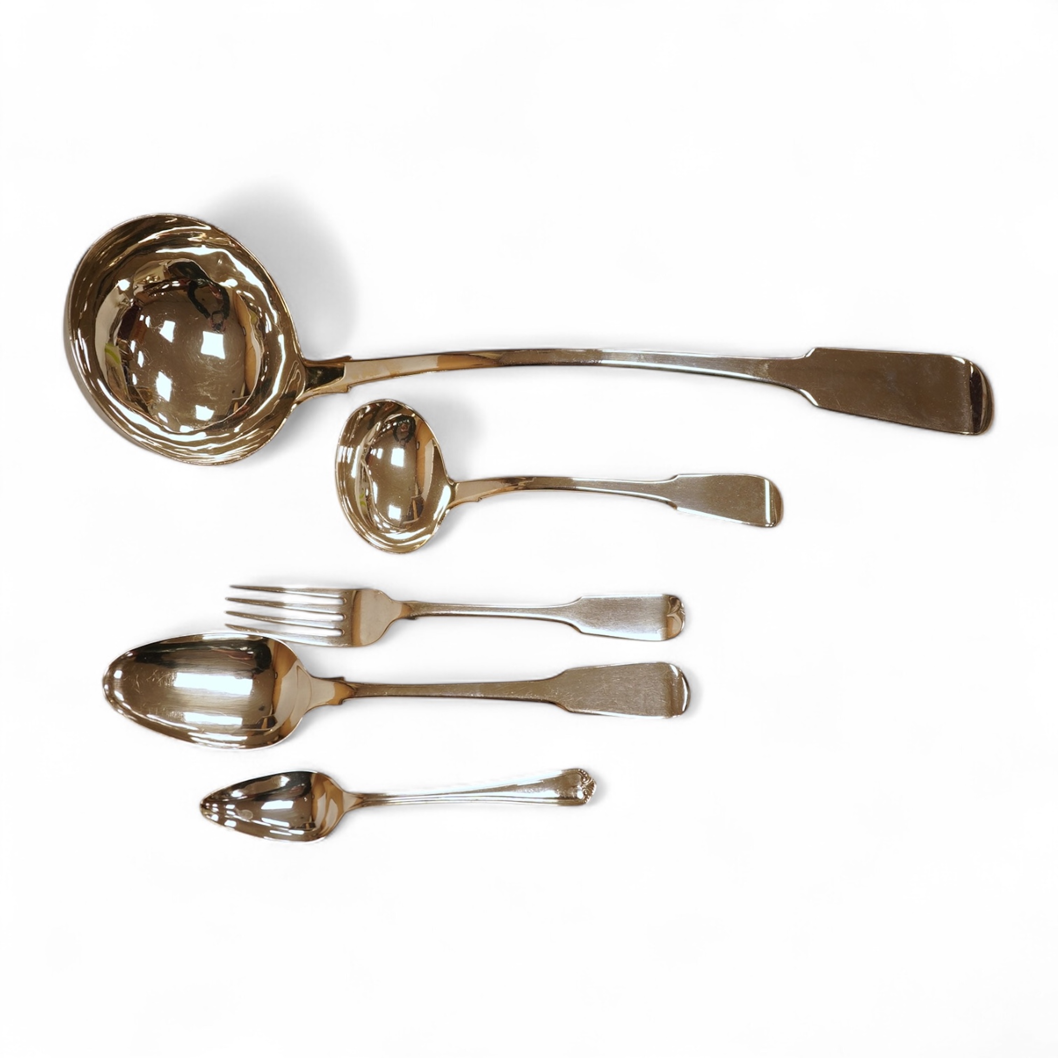 A 19th century matched part canteen of 19th century silver fiddle pattern flatware including a soup ladle and a sauce ladle, twelve table spoons, eight table forks, eight dessert forks, eight dessert spoons and six teasp